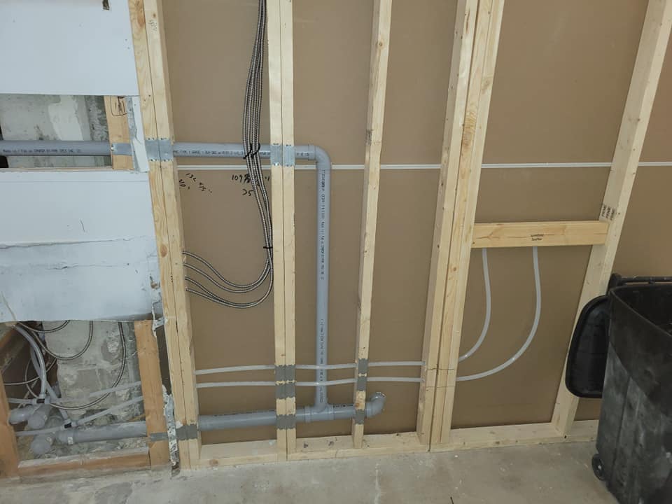 Plumbing lines installed in wall framing